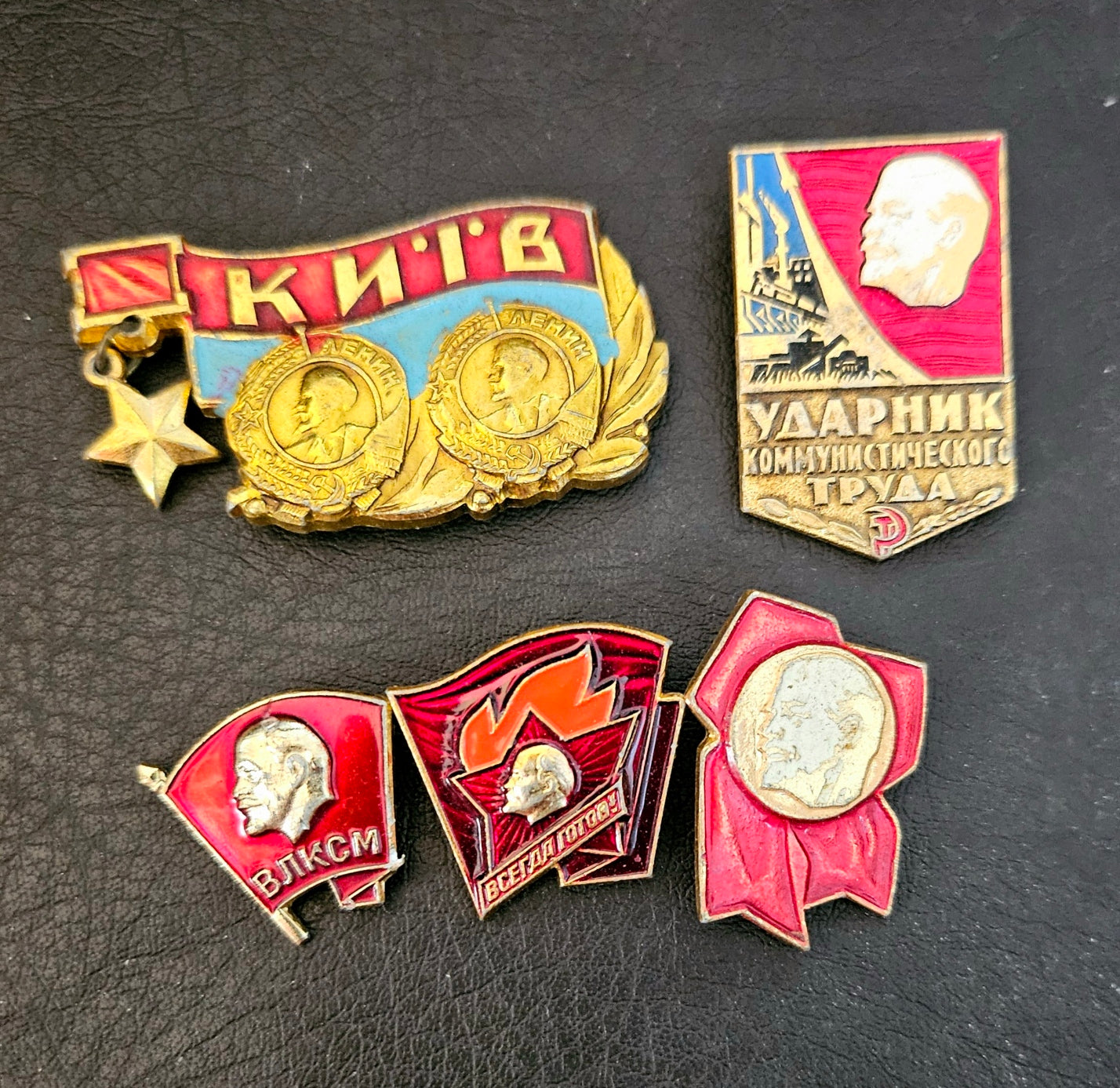 Five carious Soviet pins with Lenin on them