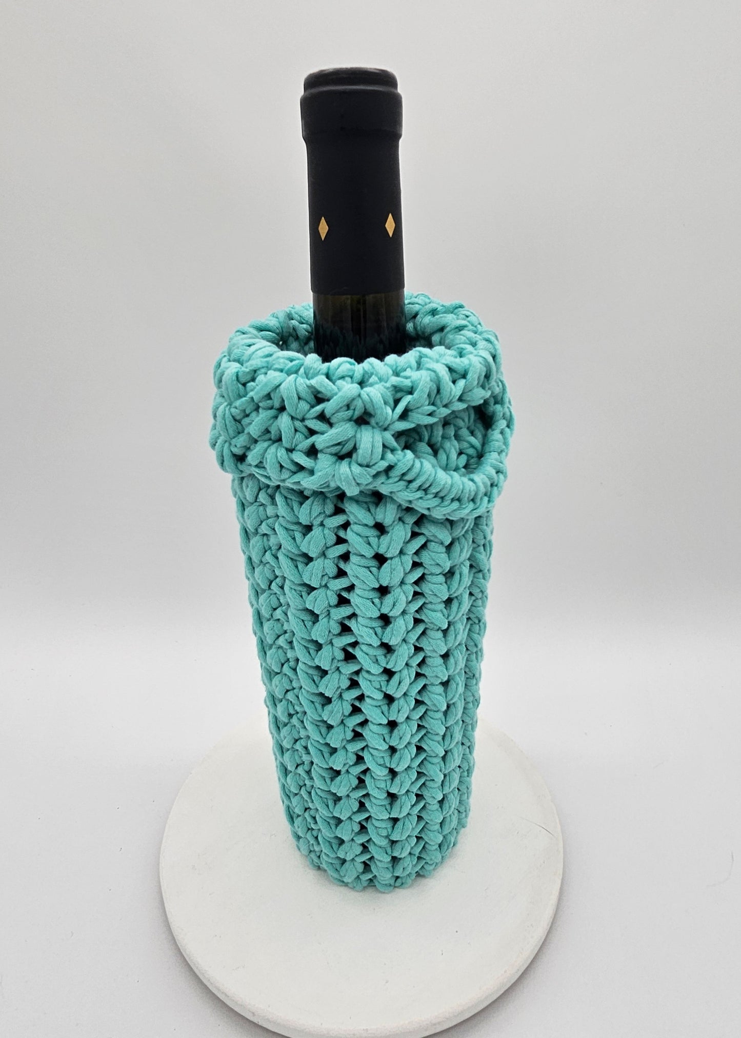 Wine bottle carriers