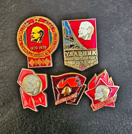 Five carious Soviet pins with Lenin on them