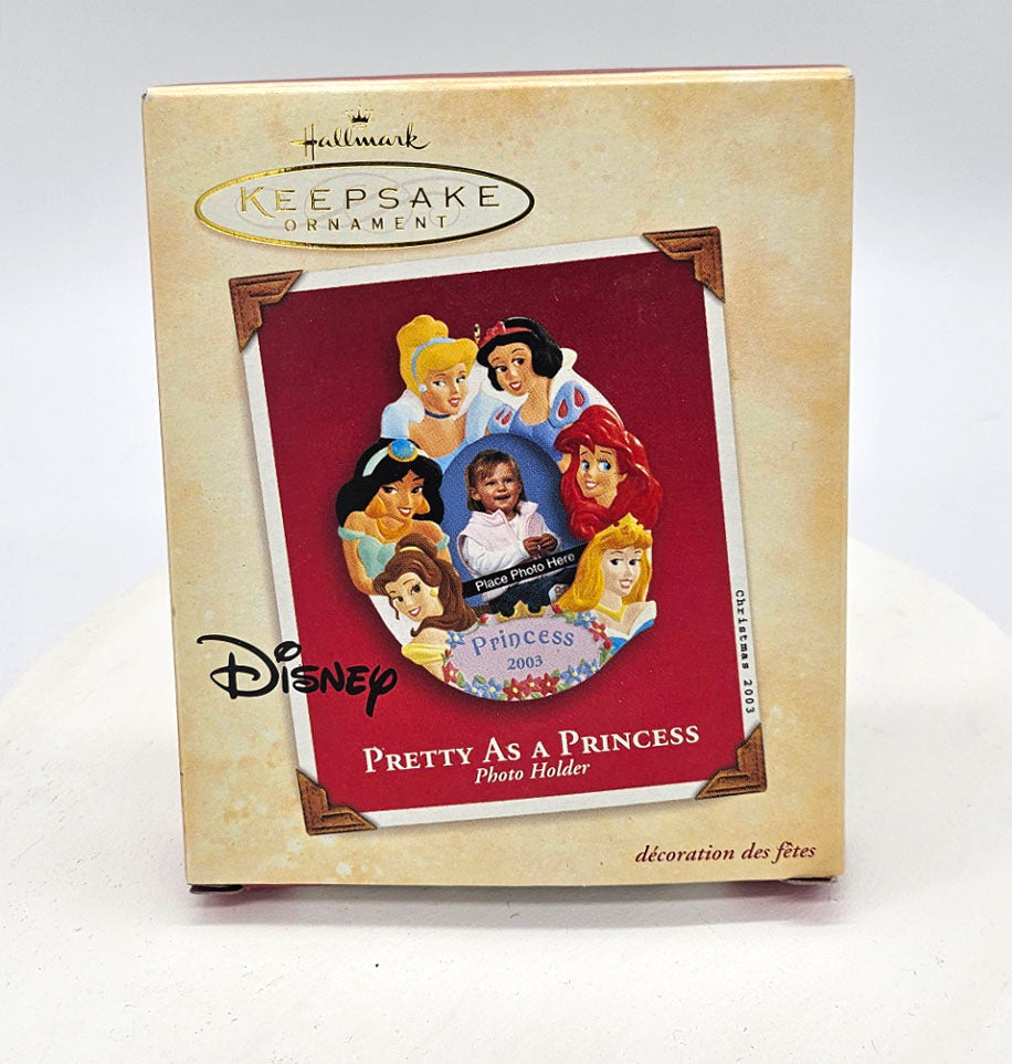 Disney Princess photo holder ornament packaging with 'Pretty As A Princess' text on a white background